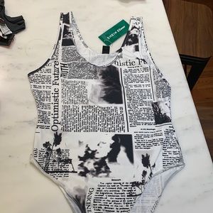 The only legible writing it the headlines on the print.